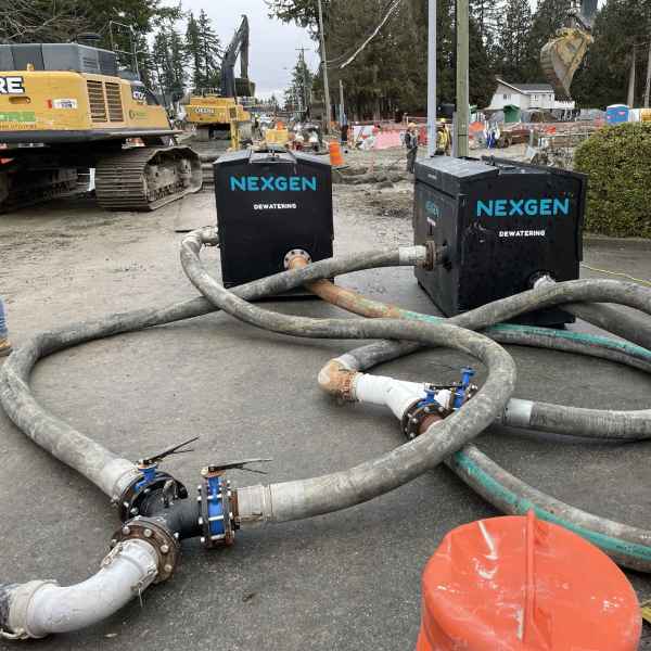 Two bypass systems units connected to dewatering hoses for efficient dewatering.